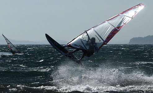 man riding a sailboard thumbnail