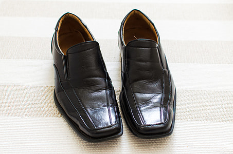 black leather loafer shoes with white text thumbnail