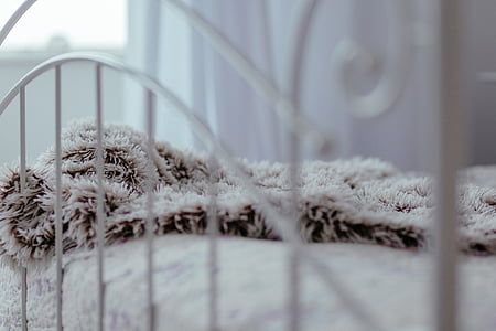 close-up photo of white bed frame thumbnail