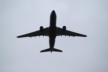 silhouette photography of plane on sky thumbnail