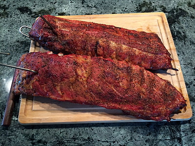 two roasted rib meats on top of cutting board thumbnail