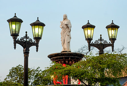 woman statue placed near street lights thumbnail
