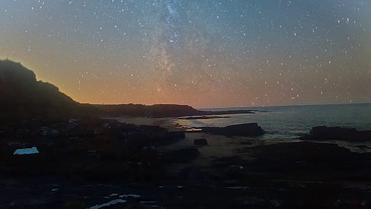 beach during nightttime thumbnail