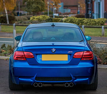 blue BMW car parked on car park thumbnail