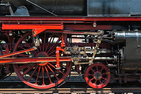 red and black train on rail thumbnail
