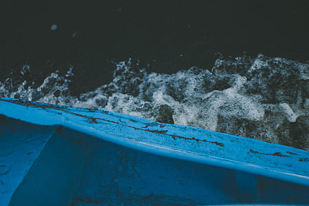blue boat on water thumbnail