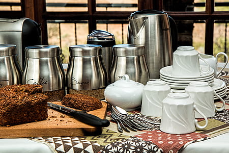 dinnerware and jars on table thumbnail
