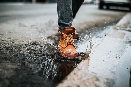 person stamp water on concrete road thumbnail