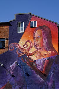 building with girl reading book murals thumbnail