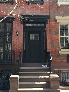 black wooden door thumbnail