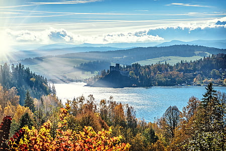 mountain near on the body of water thumbnail