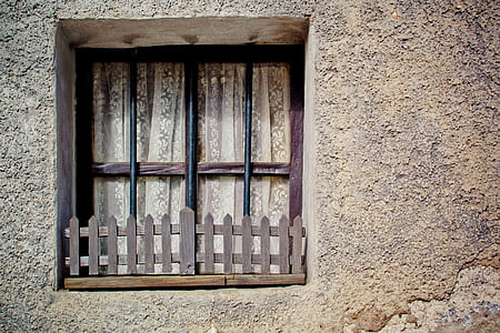 windowpane window covered with curtain photo thumbnail
