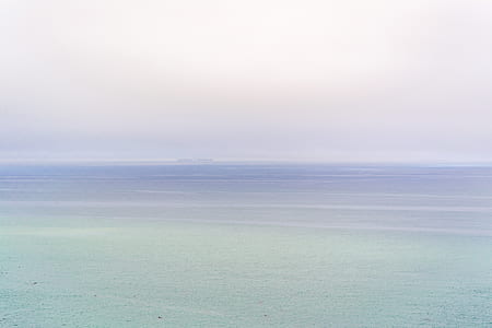 body of water under sky thumbnail