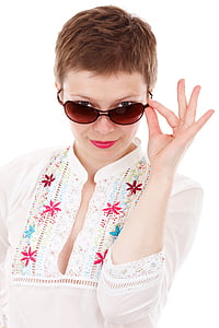 woman wearing sunglasses and white floral shirt thumbnail