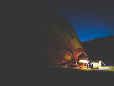 silhouette photography of hot air balloon thumbnail