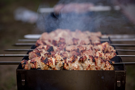 selective focus photography of meat skewer on grill thumbnail