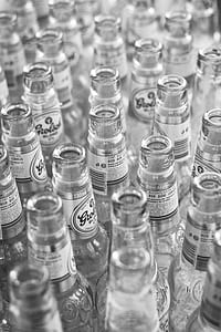 grayscale photo of glass bottles thumbnail