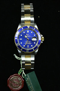 round silver-colored Rolex analog watch with link band thumbnail