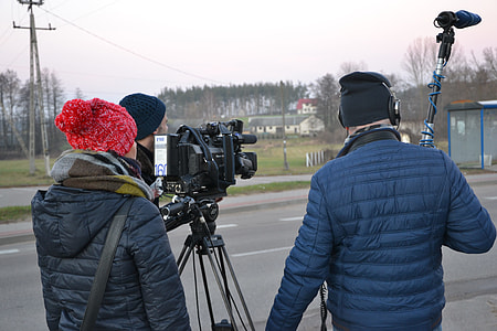 three men holding different apparatus thumbnail