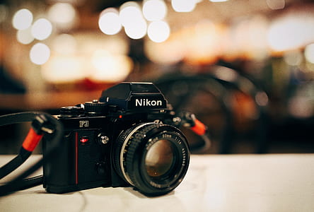 selective focus photography of Nikon bridge camera thumbnail