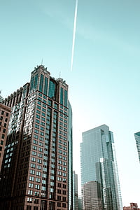 high-rise building beside high-rise building during daytime thumbnail