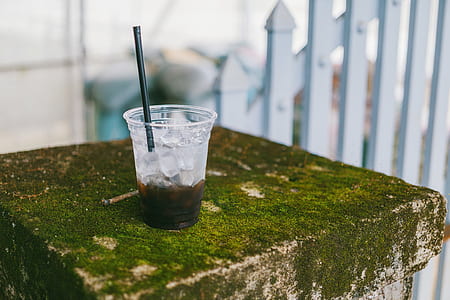 Disposable Cup With Black Beverage thumbnail