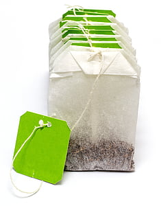 several tea bags with green labels thumbnail