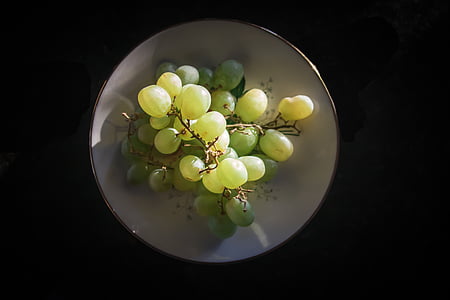 green grapes served on white ceramic plate thumbnail