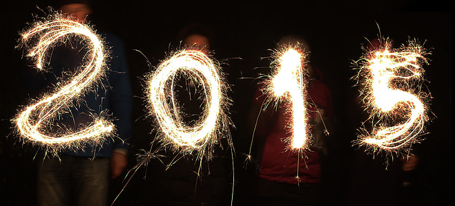 four people holding 2015 sparkler thumbnail