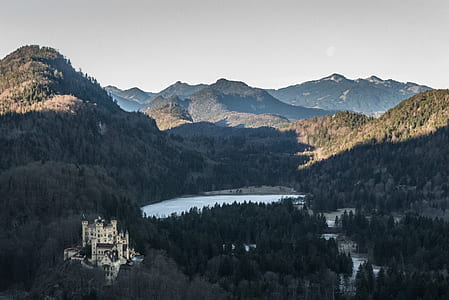 aerial photo of mountain with green leaf tress and lake thumbnail
