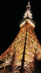 worm's eye view of tower during nighttime thumbnail