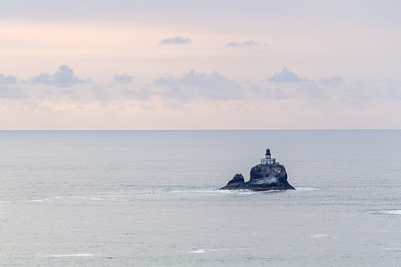 lighthouse in the middle of the sea thumbnail