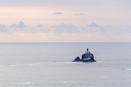 white lighthouse on boulder thumbnail