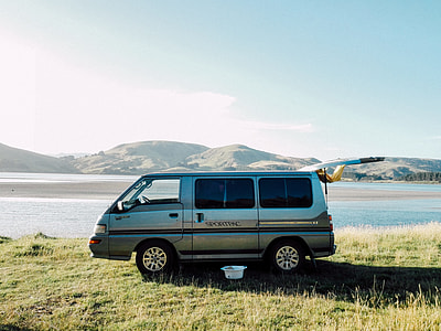 grey van near lake thumbnail