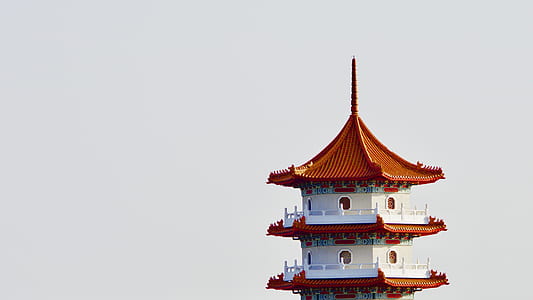 architectural photography of red and white concrete structure thumbnail