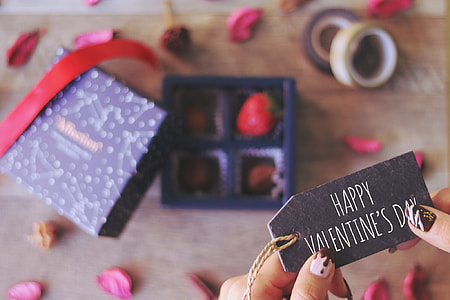 person holding Happy Valentine's Day print card thumbnail