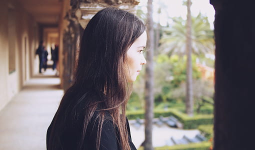 woman wearing black coat thumbnail