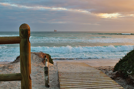 brown wooden dock near seashore thumbnail