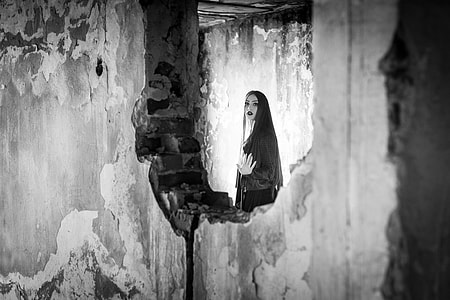 woman wearing black dress shirt in grayscale photography thumbnail