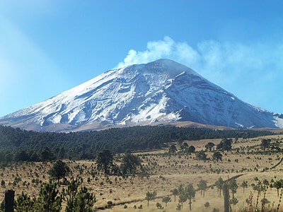 white and brown mountain under blue sky during daytime thumbnail