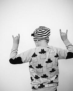 grayscale photography of person facing backward thumbnail