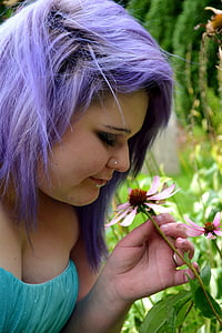 woman smelling pink rose thumbnail