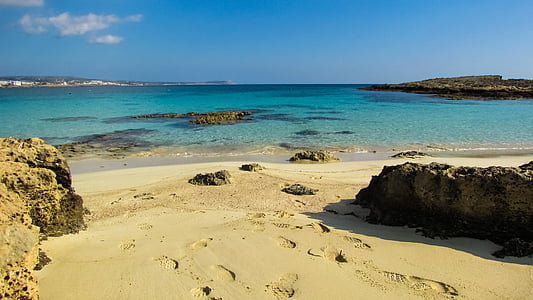 foot prints beside sea thumbnail