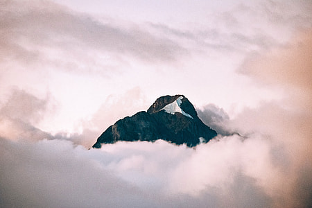 mountain surrounded with white clouds thumbnail