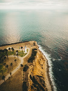 bird's eye view of white lighthouse thumbnail