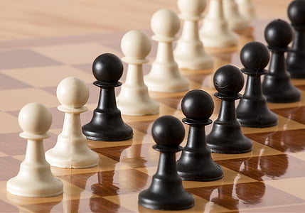closeup photo of chess pieces on board thumbnail