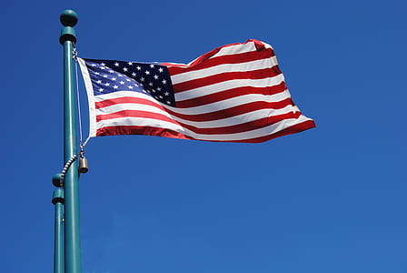 worm's-view photo of USA flag thumbnail