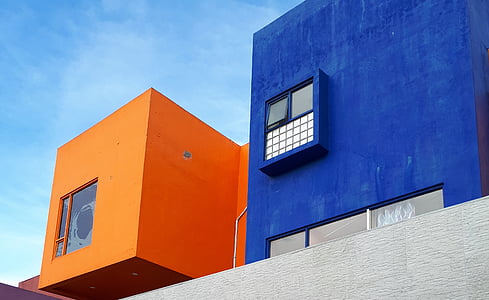 blue house beside orange house thumbnail