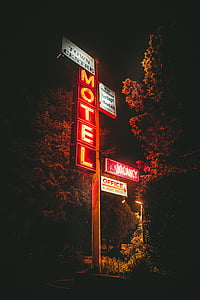 lighted Motel signage during nighttime thumbnail