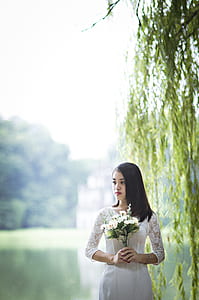 woman wearing white wedding gown thumbnail